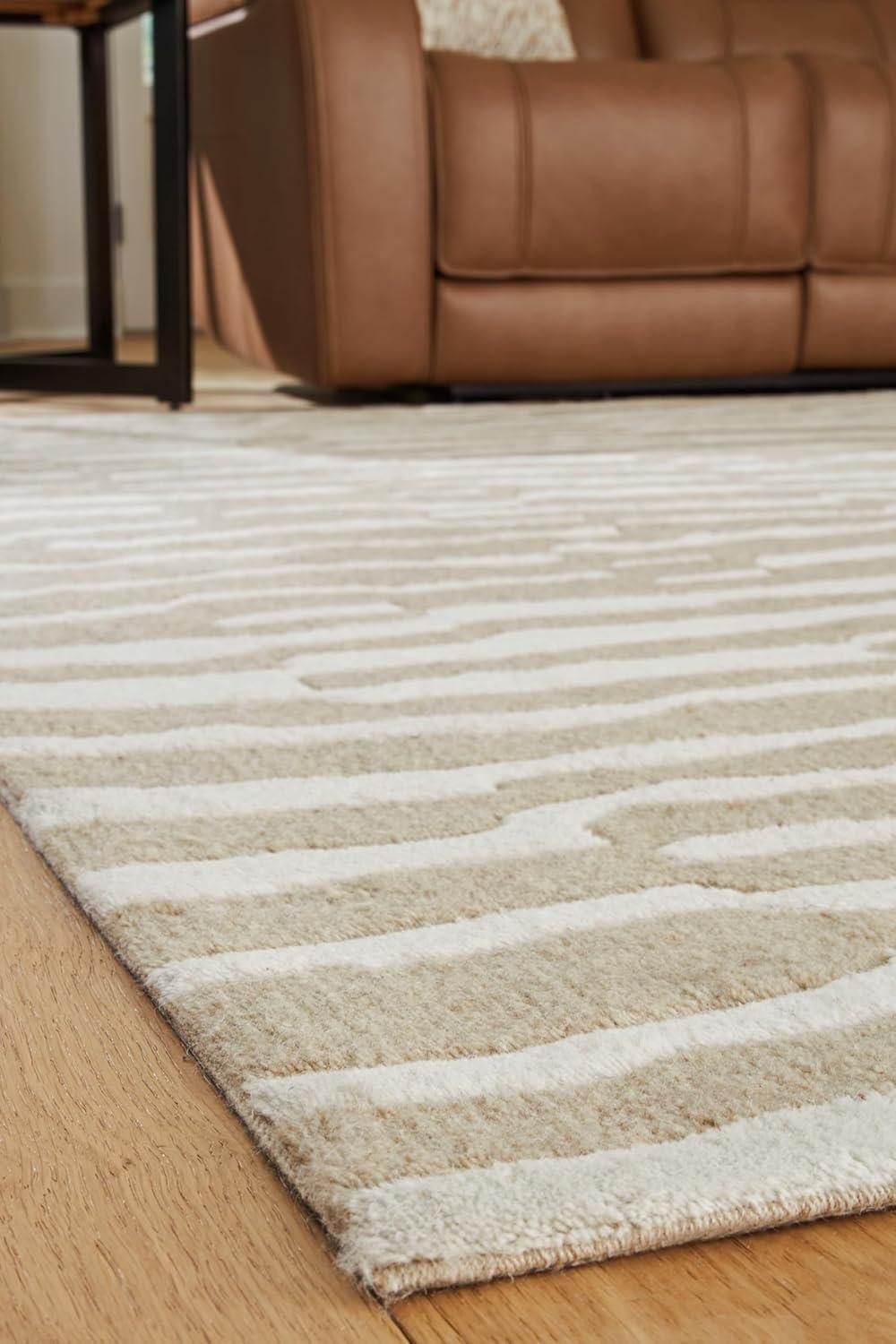 imageSignature Design by Ashley Corrbell Large Casual Rug Machine Woven Pile Abstract Design WoolPolyester Blend 93 W x 121 D x 038 H BeigeWhite
