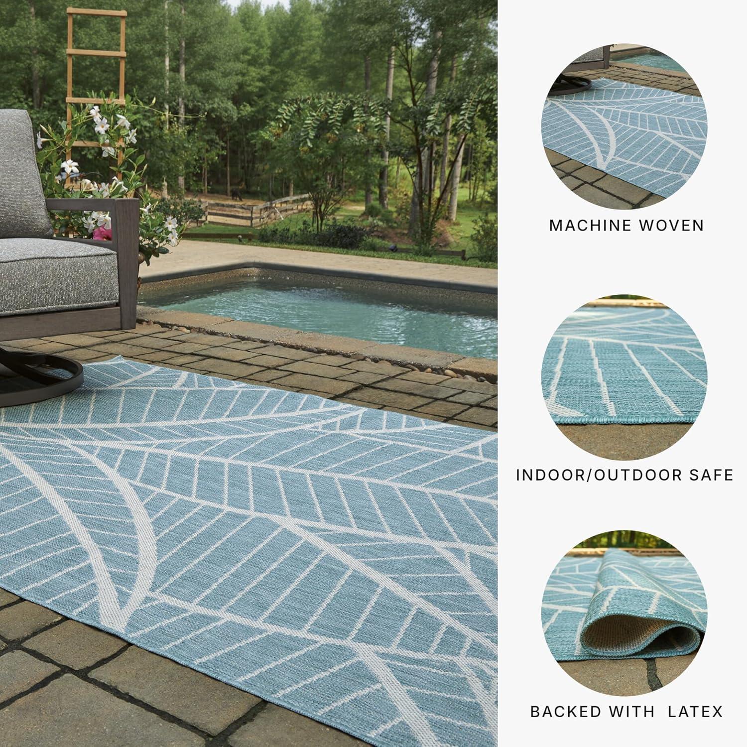 imageSignature Design by Ashley Hulsia Coastal IndoorOutdoor Botanical 5 x 7 Rug with Non Slip Backing Light Blue amp White