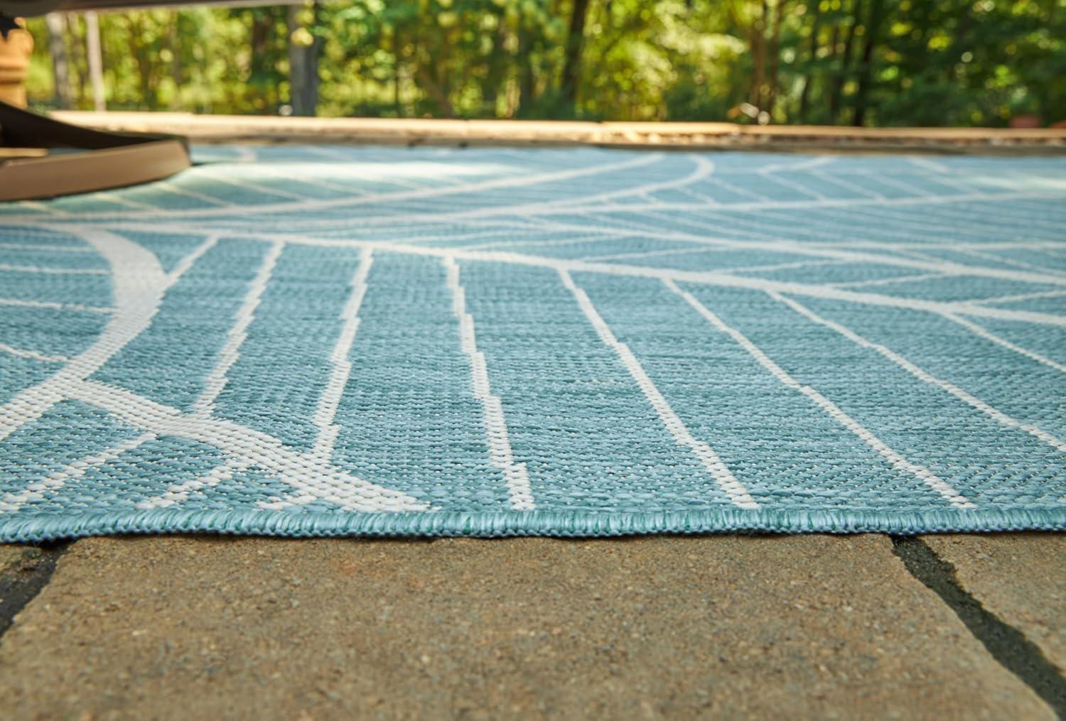 imageSignature Design by Ashley Hulsia Coastal IndoorOutdoor Botanical 5 x 7 Rug with Non Slip Backing Light Blue amp White
