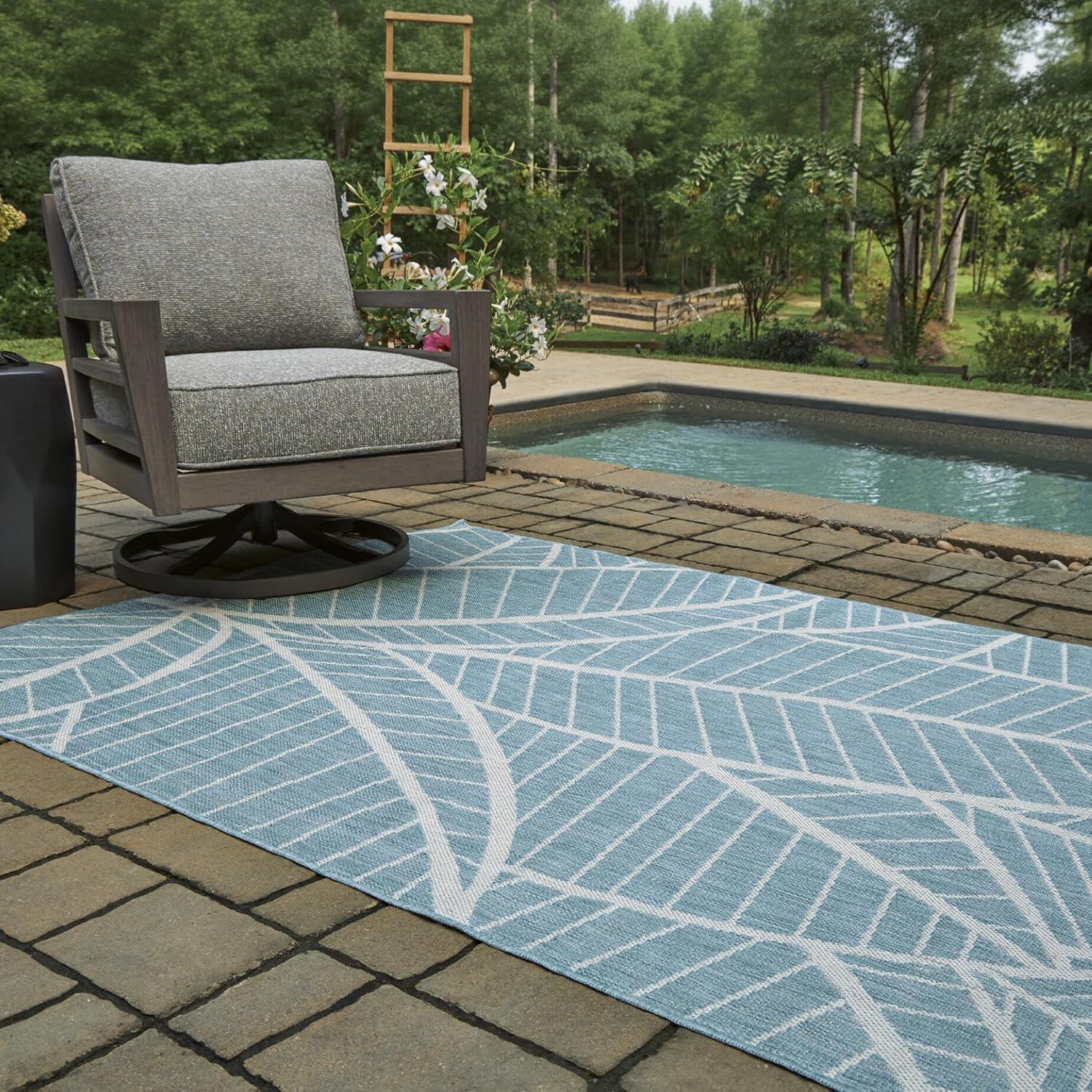 imageSignature Design by Ashley Hulsia Coastal IndoorOutdoor Botanical 5 x 7 Rug with Non Slip Backing Light Blue amp White