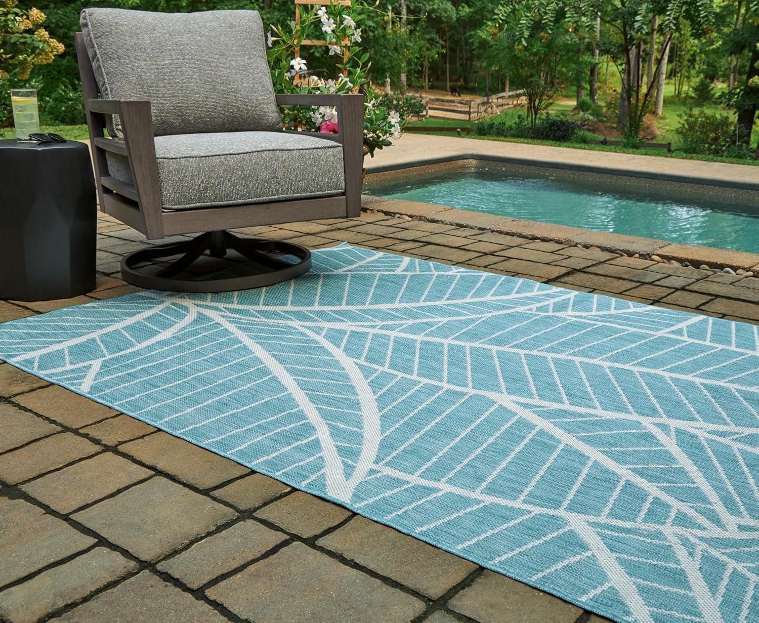 imageSignature Design by Ashley Hulsia Coastal IndoorOutdoor Botanical 5 x 7 Rug with Non Slip Backing Light Blue amp White