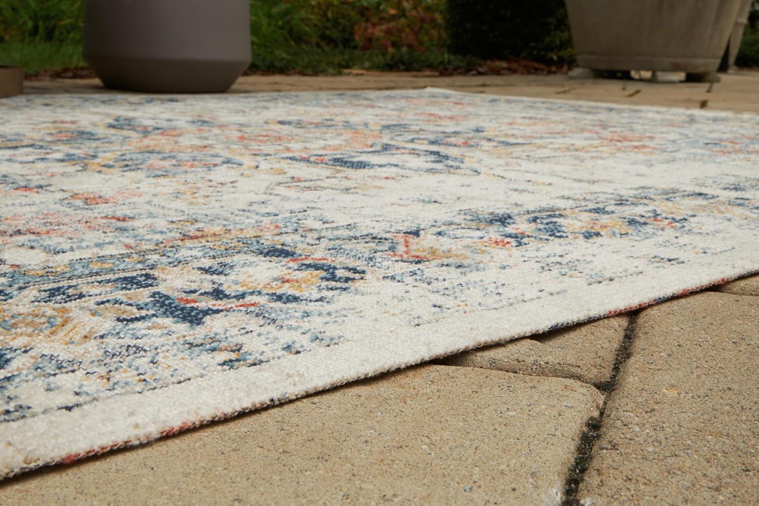 imageSignature Design by Ashley Jarrpage Classic IndoorOutdoor Medallion 5 x 7 Rug with Non Slip Backing Blue amp Orange