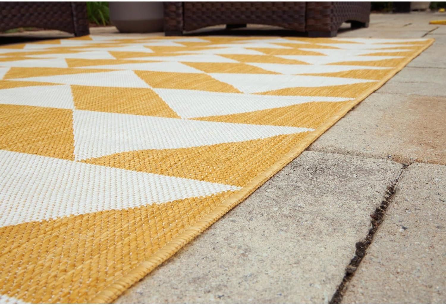 imageSignature Design by Ashley Thomley Casual IndoorOutdoor Geometric 8 x 10 Rug with Non Slip Backing Yellow amp White53 x 611 Rectangular