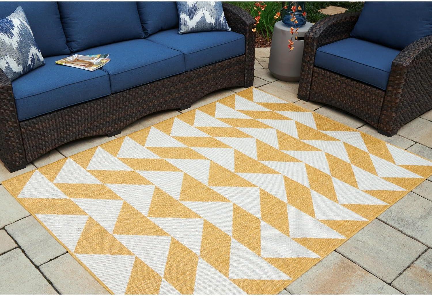 imageSignature Design by Ashley Thomley Casual IndoorOutdoor Geometric 8 x 10 Rug with Non Slip Backing Yellow amp White53 x 611 Rectangular