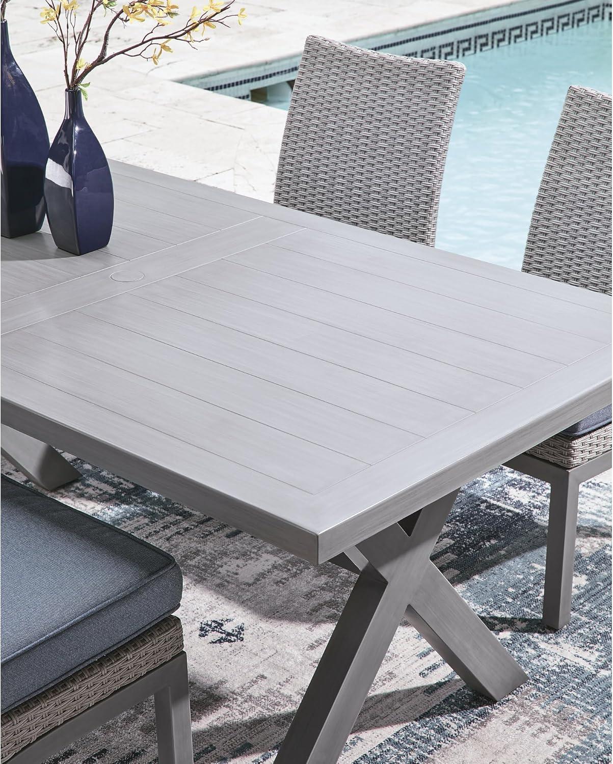 imageSignature Design by Ashley Dillon Beach Contemporary Outdoor Weather Resistant Dining Table with Umbrella Hole Light Gray