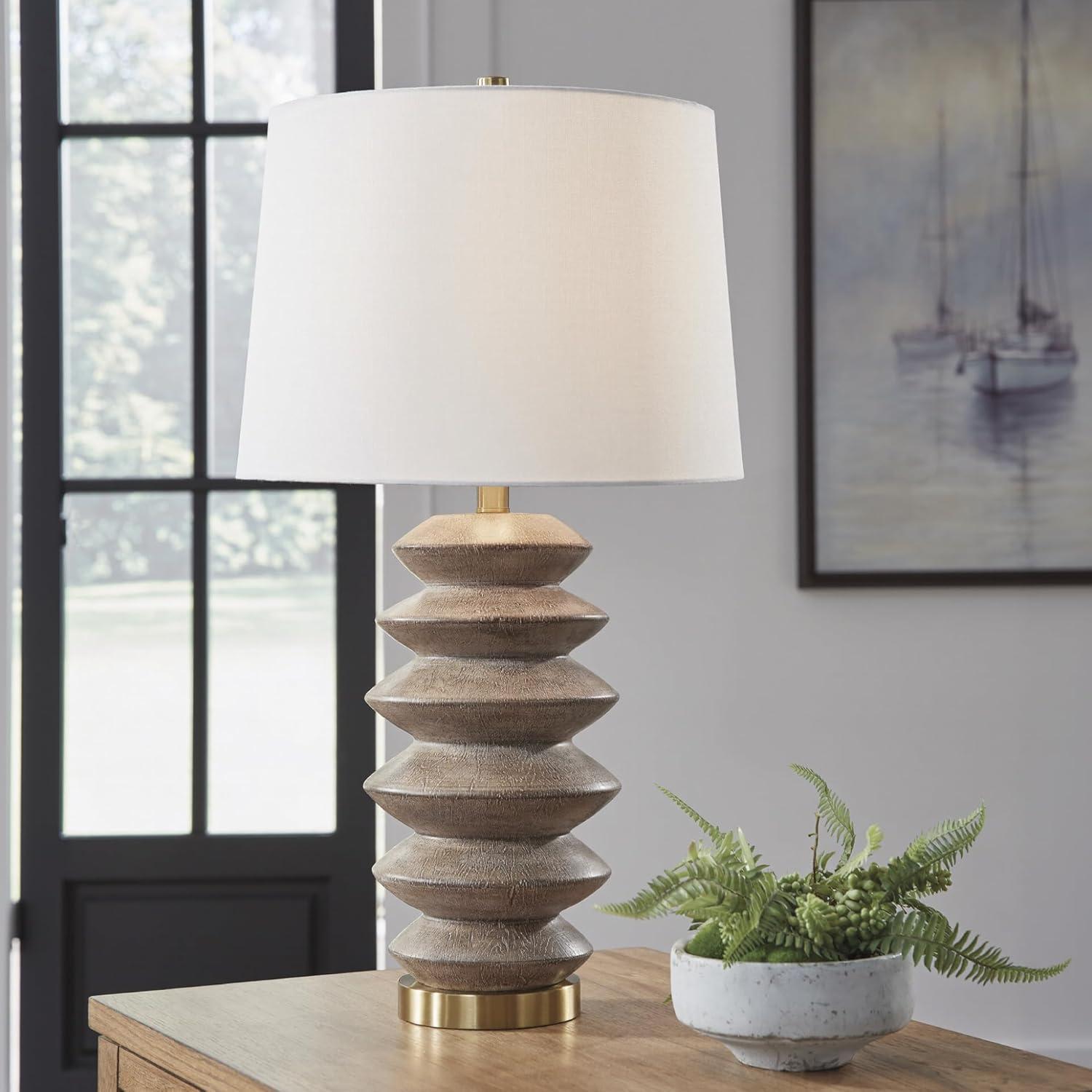 imageSignature Design by Ashley Jyllyard Contemporary Polyresin and Metal Table Lamp with 3Way Switch Light Brown amp MetallicBrownGold Finish
