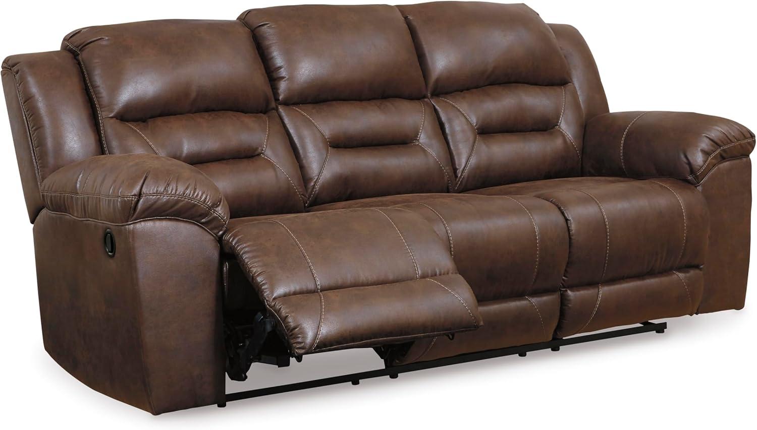 imageSignature Design by Ashley Stoneland Faux Leather Manual Double Reclining Loveseat with Center Console Dark BrownBrown