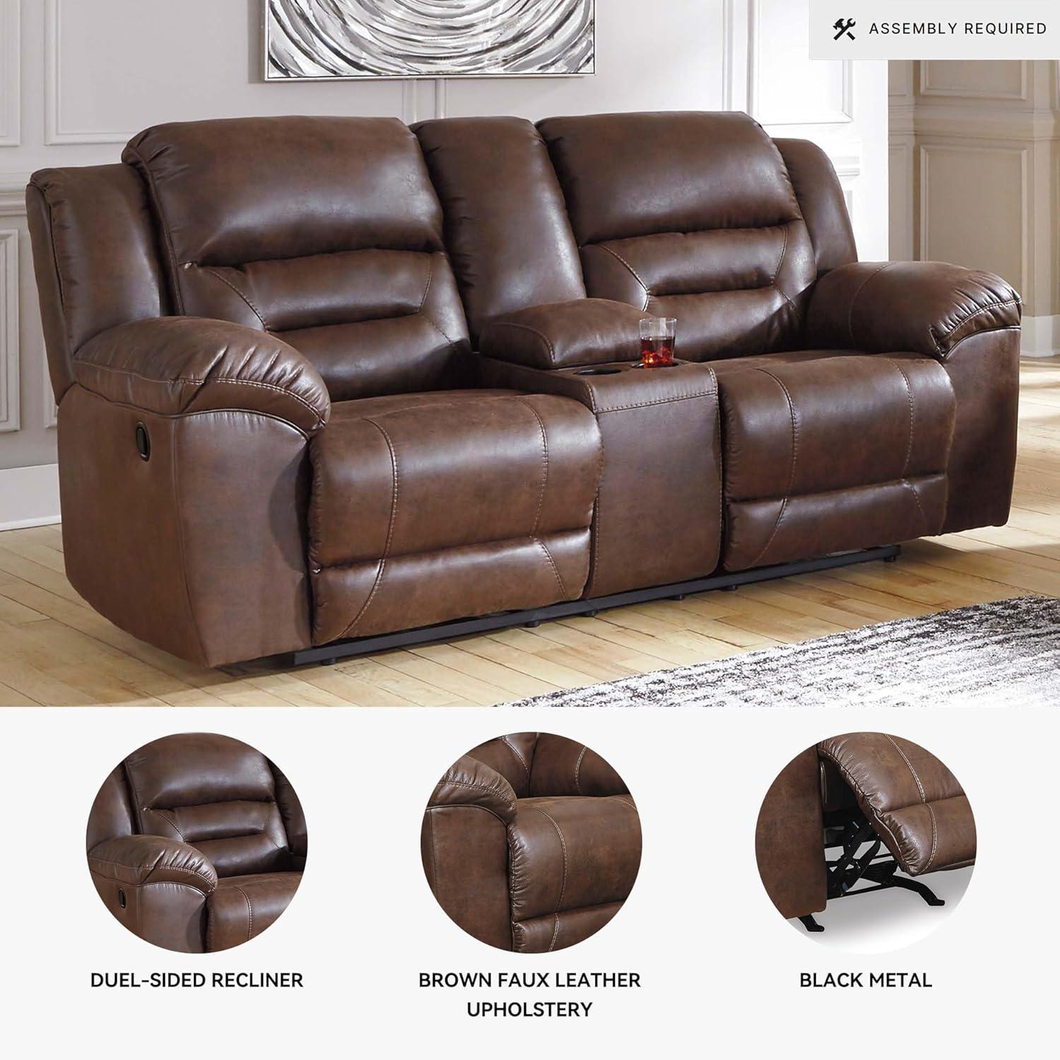 imageSignature Design by Ashley Stoneland Faux Leather Manual Double Reclining Loveseat with Center Console Dark BrownBrown
