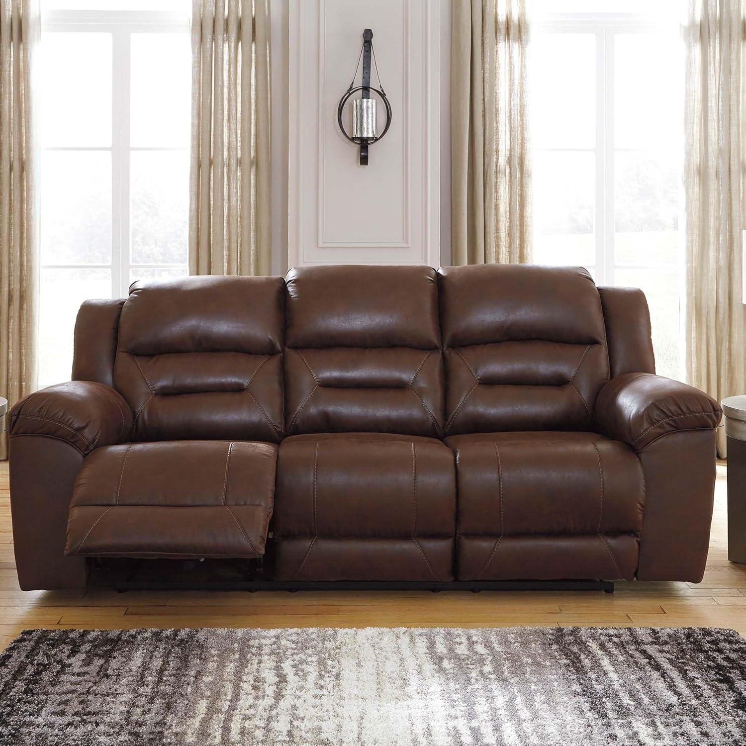 imageSignature Design by Ashley Stoneland Faux Leather Power Double Reclining Loveseat with Center Console Dark BrownBrown