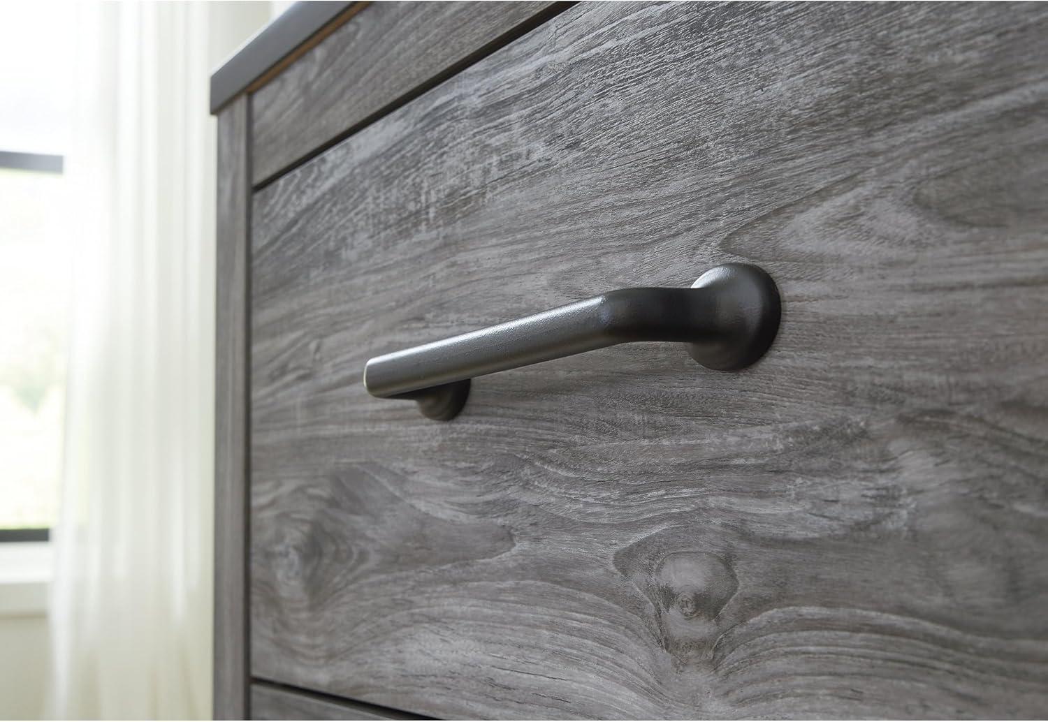 imageSignature Design by Ashley Bronyan Chest of Drawers Tall Bedroom Dresser with 4 SmoothGliding Drawers Storage Furniture with TwoTone Smoky Gray and Charcoal Finish
