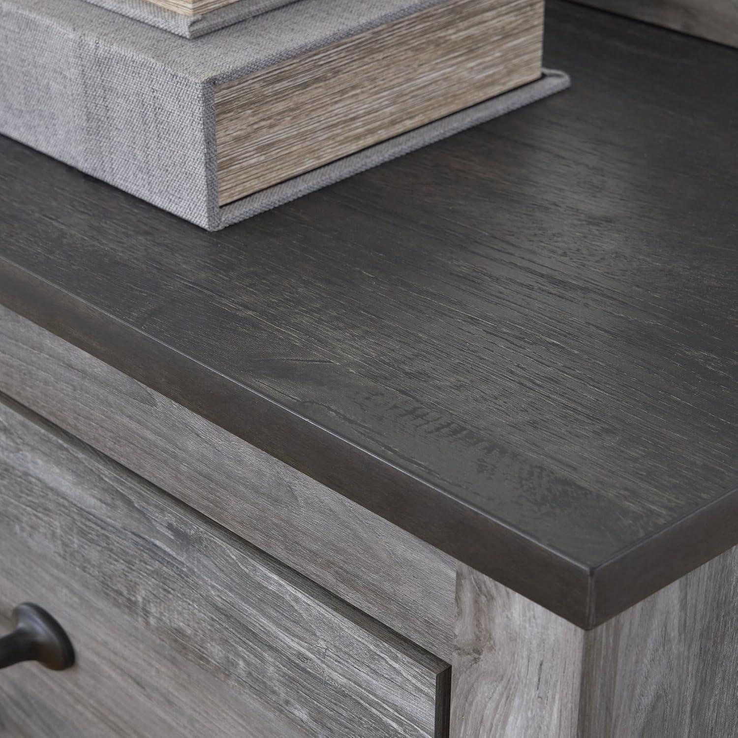 imageSignature Design by Ashley Bronyan Chest of Drawers Tall Bedroom Dresser with 4 SmoothGliding Drawers Storage Furniture with TwoTone Smoky Gray and Charcoal Finish