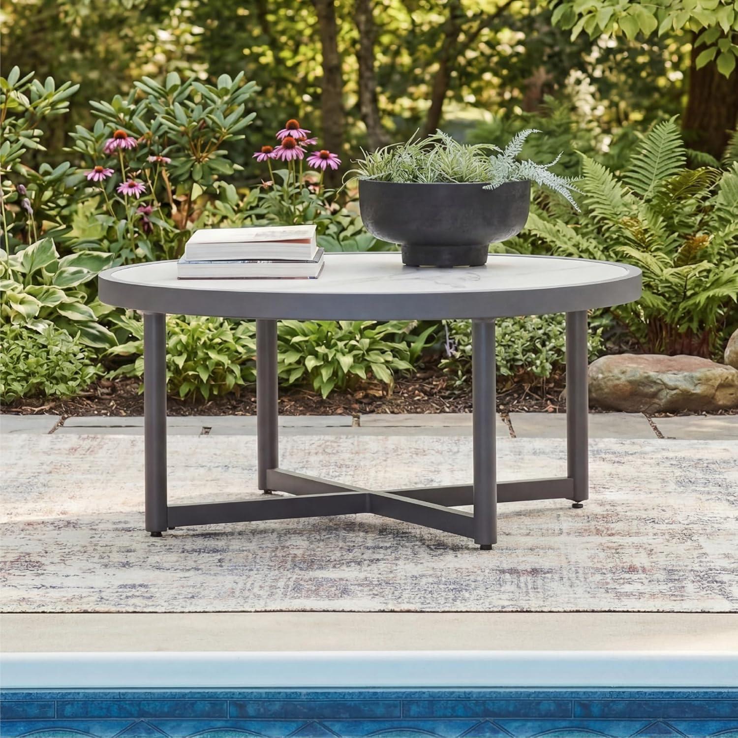 imageSignature Design by Ashley North Island Outdoor Coffee Table Contemporary Patio Table with Marble Look Sintered Stone Top RustResistant Aluminum for Porch or Patio Gray