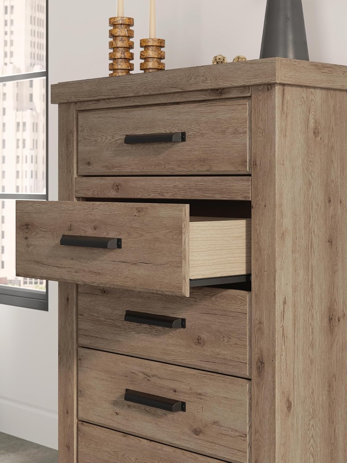 image:imageSignature Design by Ashley Contoura 5Drawer Chest of Drawers Engineered wood and decorative laminate Rustic modern style Bedroom storage use Dark bronzetone pulls European slides