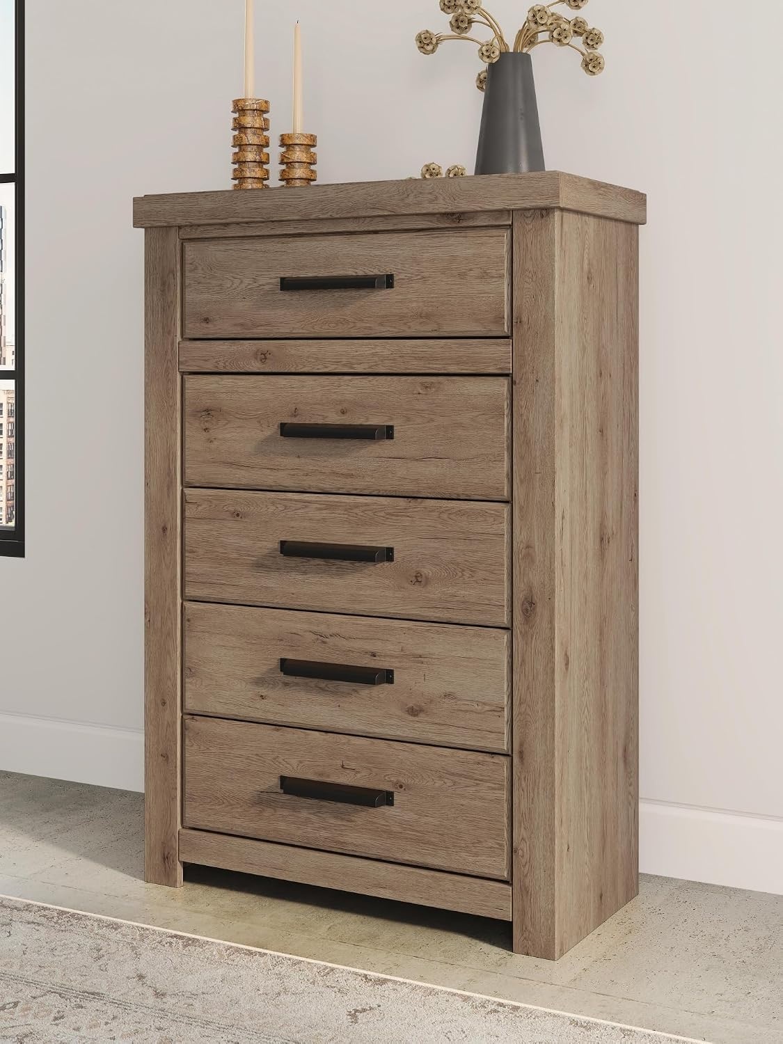 image:imageSignature Design by Ashley Contoura 5Drawer Chest of Drawers Engineered wood and decorative laminate Rustic modern style Bedroom storage use Dark bronzetone pulls European slides