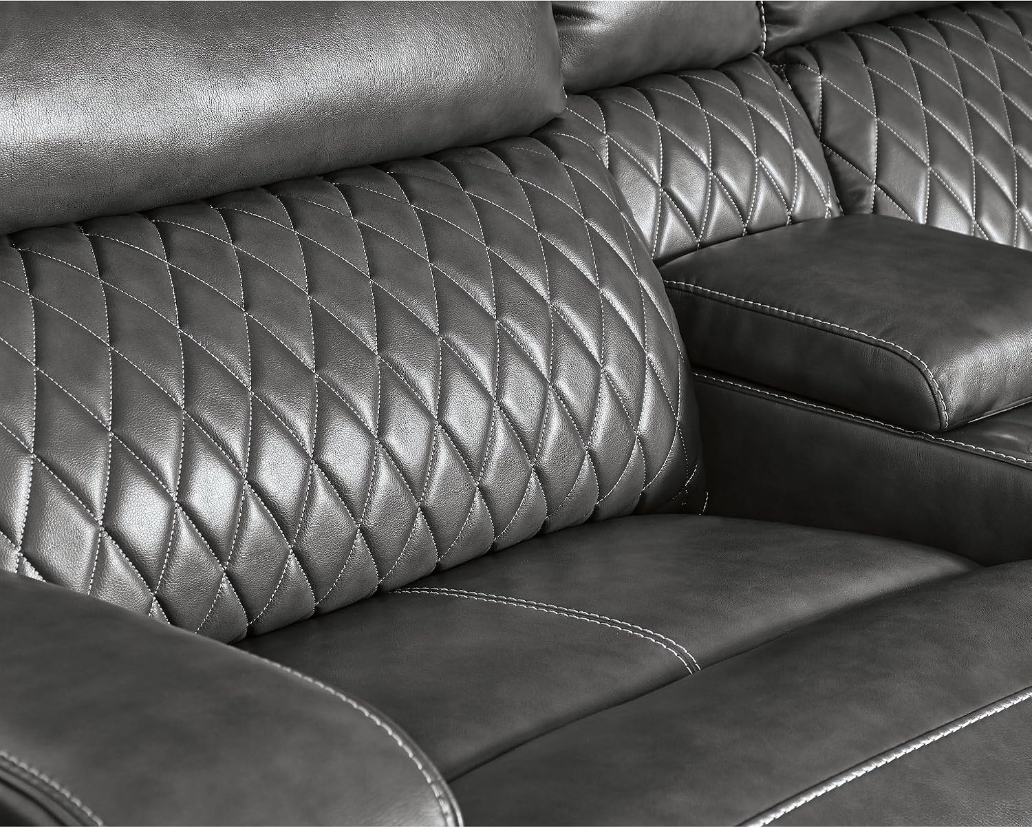 image:imageSignature Design by Ashley 6Piece Power Reclining Sectional Gray Gray faux leather upholstery Zero wall power recliner Storage console with USB ports Diamond stitch design SamperstoneGrey