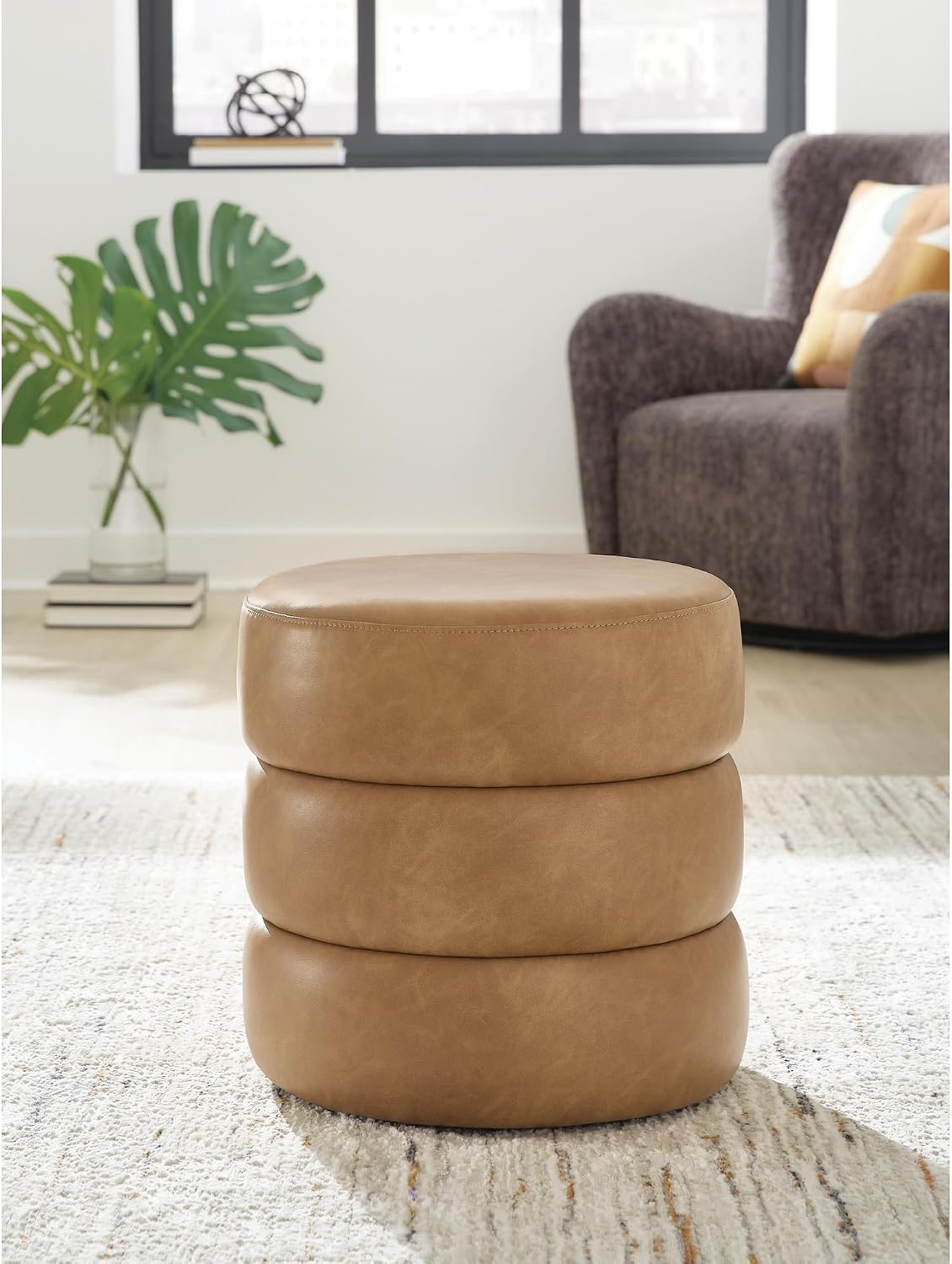 image:imageSignature Design by Ashley Ummi Modern Faux Leather Swivel Accent Ottoman Light Brown